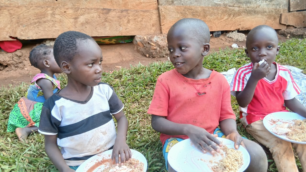 Children sharing a meal provided through Give A Smile Ministries