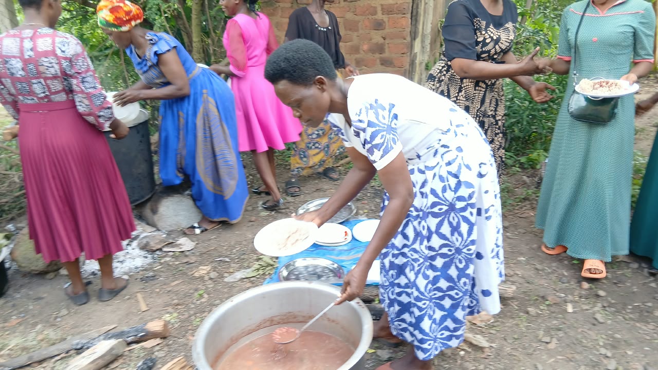 Women serving a meal to the community
